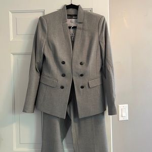 Beautiful fully lined, lightweight suit gently worn